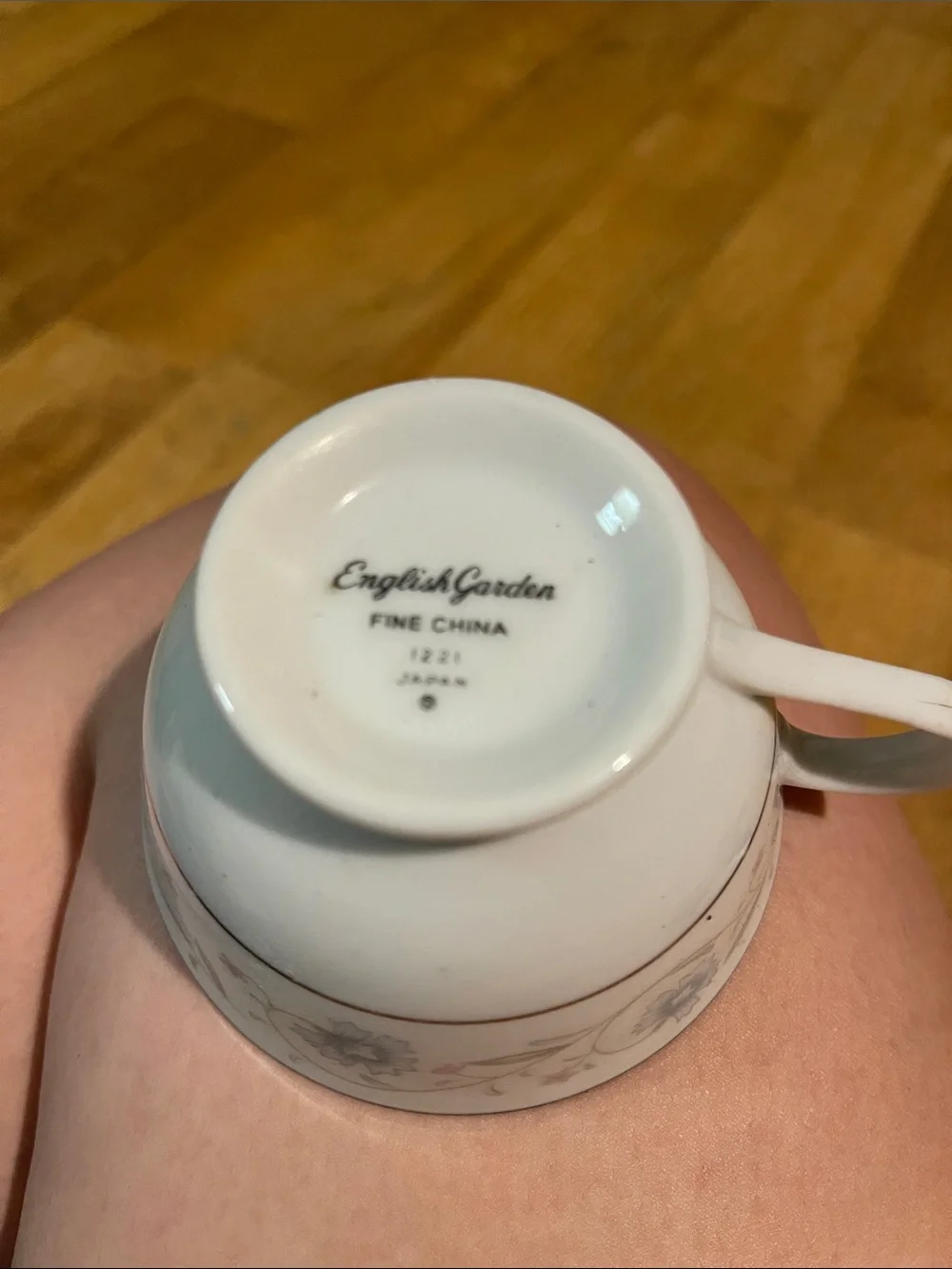 Elegant White Ceramic Teacup with Subtle Floral Accent